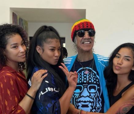 Dr. Karamo Chilombo with his three daughters